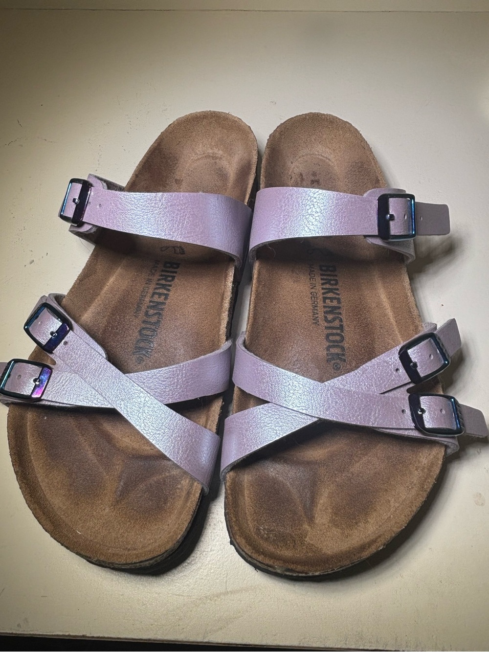 Women’s Birkenstock Lilac Sandals with blue iridescent buckle